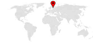 A map of the world with a pin on Finland